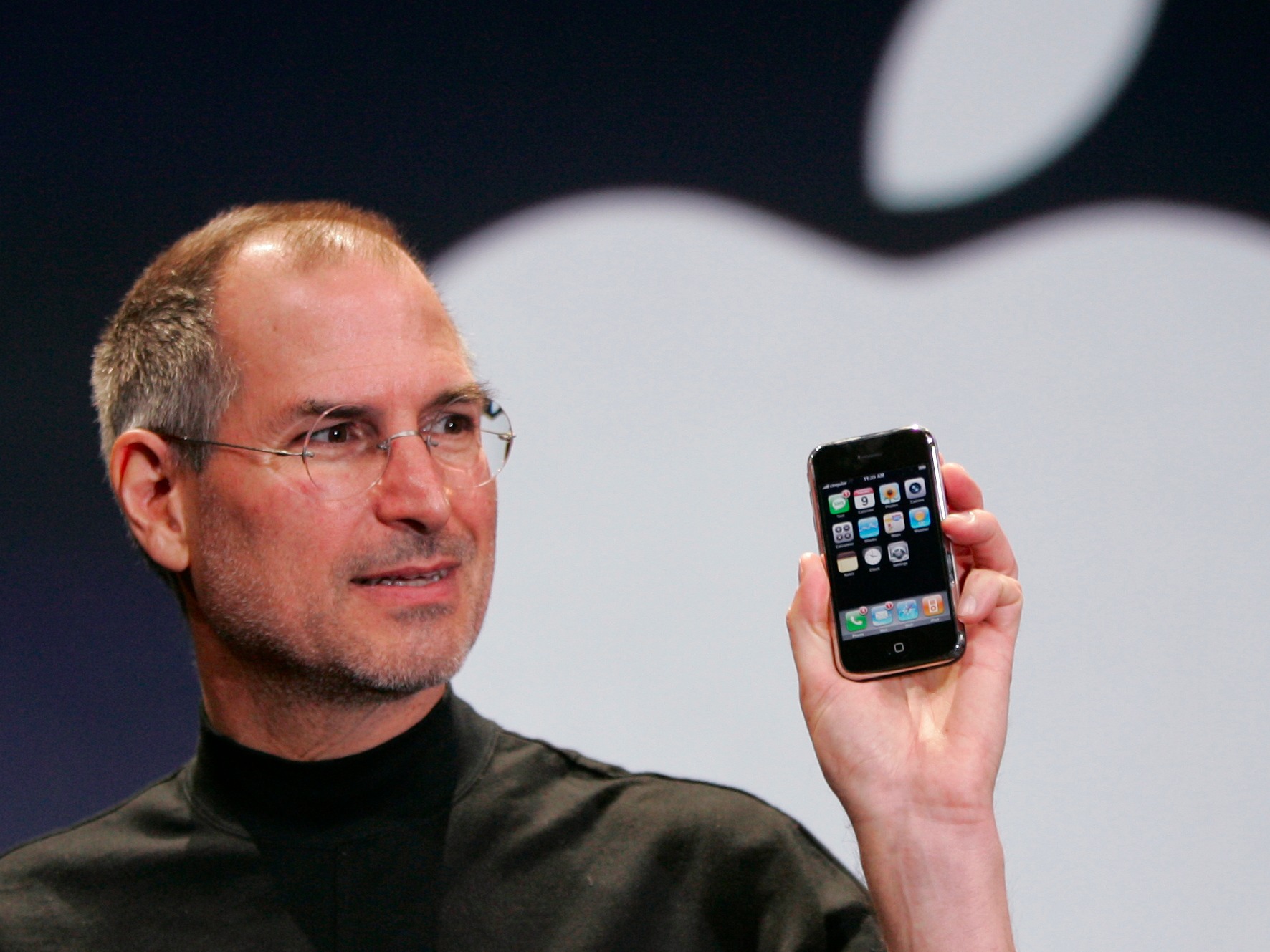 Steve Jobs Holding the 1st iPhone during its reveal in January 2007