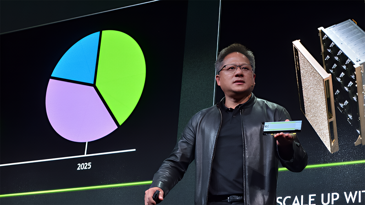 Nvidia CEO Jensen Huang holding up a board of their AI chipset